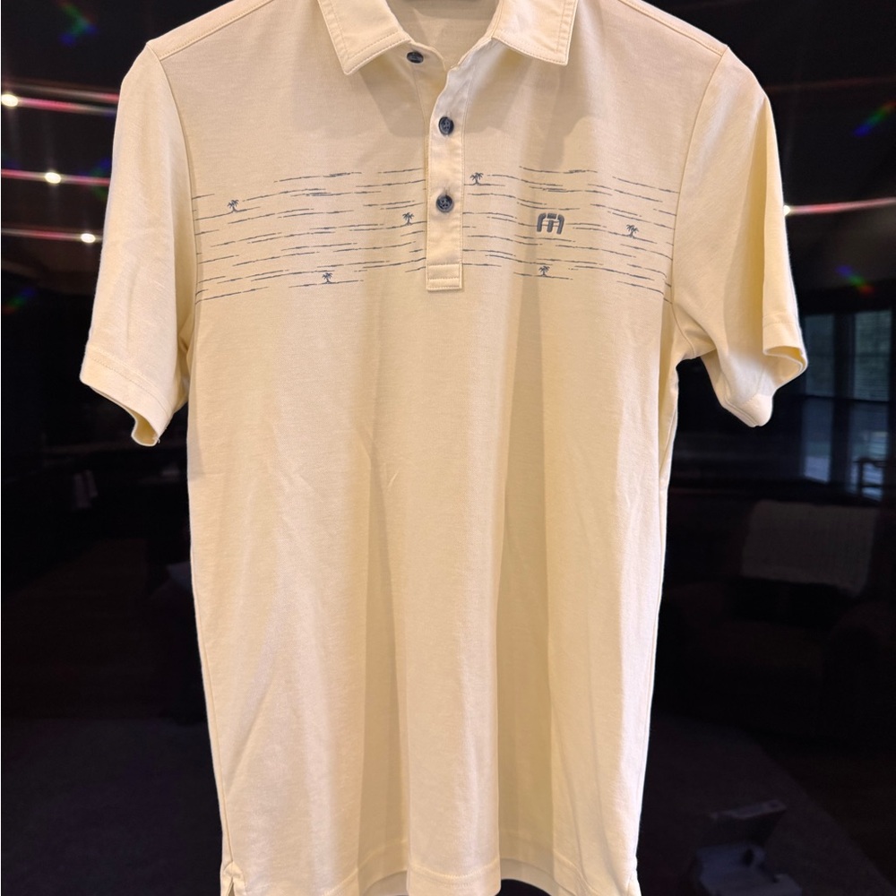 Travis Mathew Cream Polo Shirt with Subtle Stripe Design